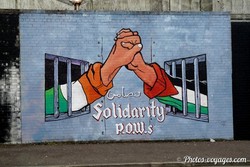 Mural sur la solidarité dans un quartier de Belfast